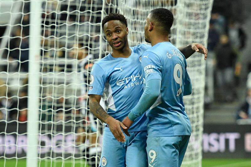 Raheem Sterling  celebrates with Gabriel Jesus after scoring City's fourth goal. AFP