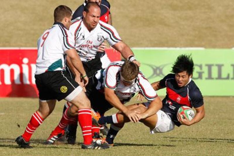 Renier Els, centre, the UAE captain, said there were no excuses for the defensive mistakes that saw the Emirates lose their opening Cup of Nations fixture 72-14 to Hong Kong on Saturday.