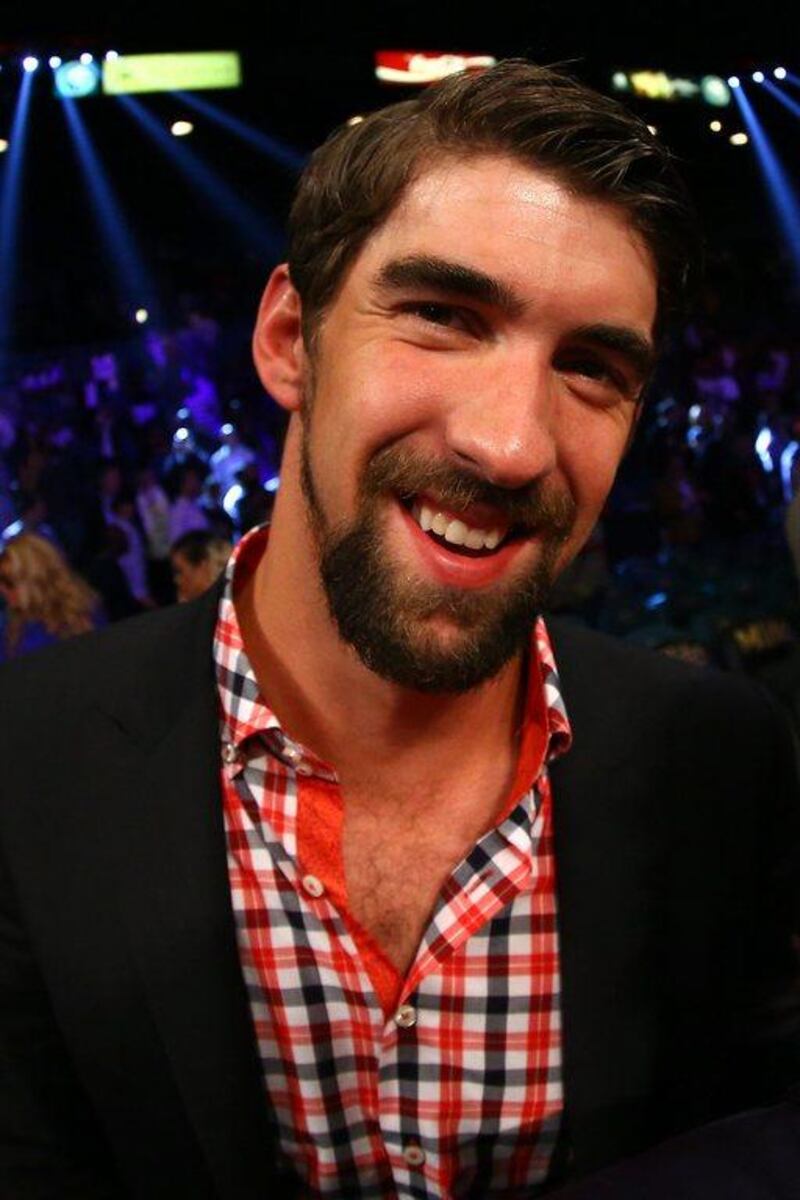Michael Phelps, the American swimming great, is also at the event, sporting a new look. Al Bello / Getty Images / AFP