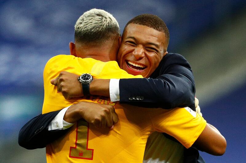 Kylian Mbappe celebrates with goalkeeper Keylor Navas. AFP