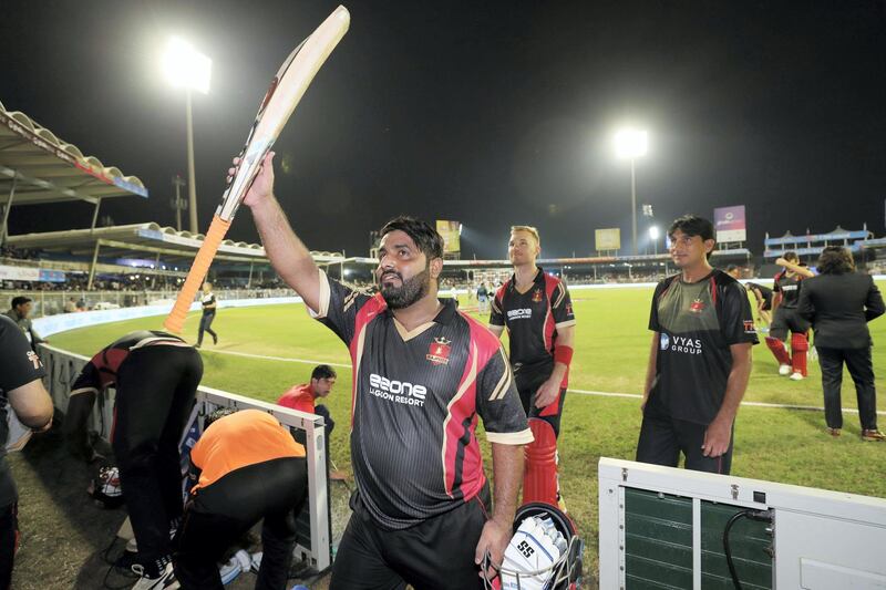 Sharjah, United Arab Emirates - November 21, 2018: Mohammad Shahzad of Rajputs scores 74 off 16 balls during the game between Sindhis and Rajputs in the T10 league. Wednesday the 21st of November 2018 at Sharjah cricket stadium, Sharjah. Chris Whiteoak / The National