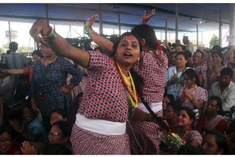 Gurkha women dance during a ceremony last month to mark the signing of an agreement to create the Gorkhaland Territorial Administration in the north-east of the Indian state of West Bengal. Tamal Roy / AP Photo