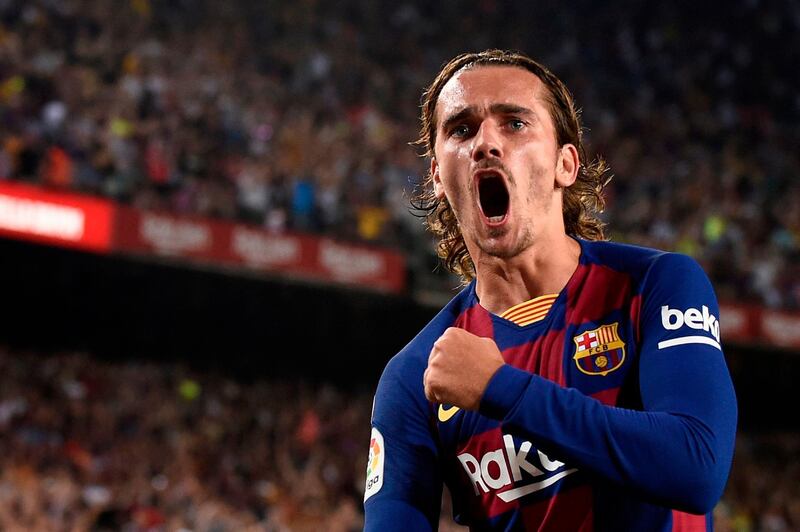 Barcelona's French forward Antoine Griezmann celebrates after scoring a second goal against Real Betis at Camp Nou. AFP