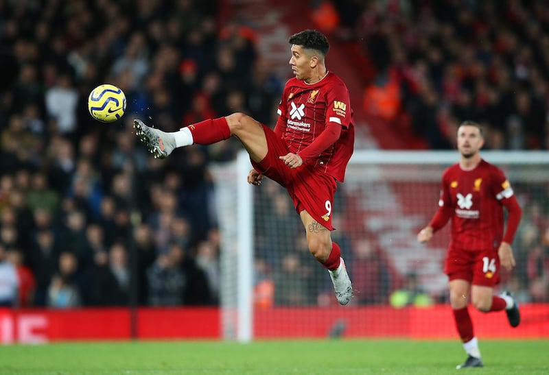 LIVERPOOL, ENGLAND - OCTOBER 27:  Roberto Firmino of Liverpool controls the ball during the Premier League match between Liverpool FC and Tottenham Hotspur at Anfield on October 27, 2019 in Liverpool, United Kingdom. (Photo by Jan Kruger/Getty Images)