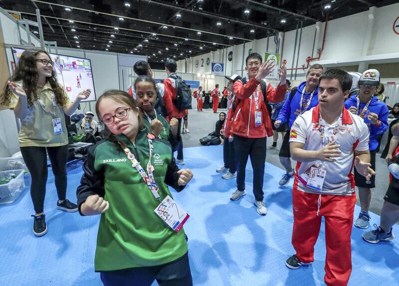 Abu Dhabi, March 17, 2019.  Special Olympics World Games Abu Dhabi 2019. At the Healthy Athletes area at ADNEC.  This is an area where the special athletes may get free medical check ups and enjoy other health activities. --  Athletes dance to the video at the Physical Activity Area at Hall 1. Victor Besa/The National