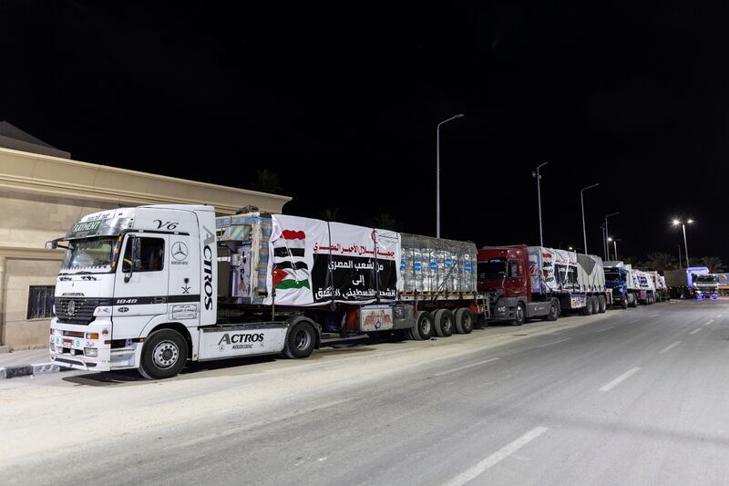 Laden aid lorries wait for the opening of the Gaza-Egypt border in North Sinai, Egypt. Getty Images