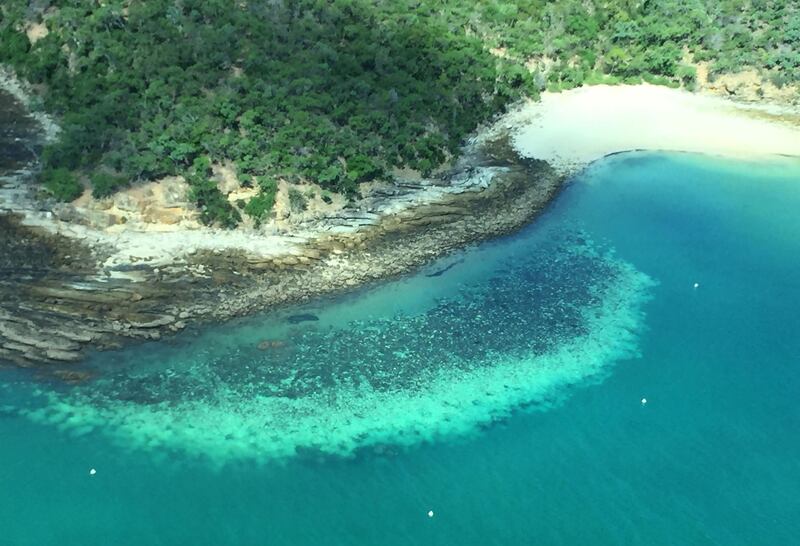 This undated handout photo received on April 6, 2020 from the ARC Centre of Excellence for Coral Reef Studies at James Cook University, shows an aerial survey of coral bleaching on the Great Barrier Reef. Australia's Great Barrier Reef has suffered its most widespread coral bleaching on record, scientists said on April 7, 2020 in a dire warning about the threat posed by climate change to the world's largest living organism. James Cook University professor Terry Hughes said a comprehensive survey last month found record sea temperatures had caused the third mass bleaching of the 2,300-kilometre (1,400-mile) reef system in just five years.
 - TO BE USED EXCLUSIVELY FOR AFP STORY AUSTRALIA-ENVIRONMENT-CLIMATE-REEF
RESTRICTED TO EDITORIAL USE - MANDATORY CREDIT "AFP PHOTO / JAMES COOK UNIVERSITY" - NO MARKETING NO ADVERTISING CAMPAIGNS - DISTRIBUTED AS A SERVICE TO CLIENTS - NO ARCHIVE

 / AFP / JAMES COOK UNIVERSITY AUSTRALIA / Handout / TO BE USED EXCLUSIVELY FOR AFP STORY AUSTRALIA-ENVIRONMENT-CLIMATE-REEF
RESTRICTED TO EDITORIAL USE - MANDATORY CREDIT "AFP PHOTO / JAMES COOK UNIVERSITY" - NO MARKETING NO ADVERTISING CAMPAIGNS - DISTRIBUTED AS A SERVICE TO CLIENTS - NO ARCHIVE

