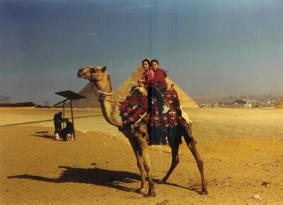 On holiday in Cairo visiting the Pyramids when Sarah was 10 and Laura seven. Photo: The Ayoub Sisters