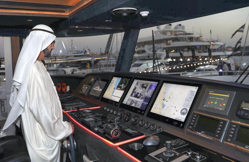 Sheikh Mohammed bin Rashid tours a luxury yacht during his visit to the Dubai International Boat Show at Dubai Canal. Wam