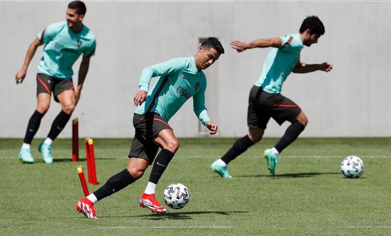 Cristiano Ronaldo runs with the ball during a training session at Illovszky Rudolf Stadium. Reuters