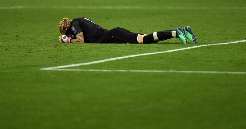 Loris Karius of Liverpool looks dejected after the defeat. David Ramos / Getty Images