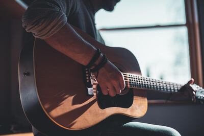 Learning an instrument can help you to de-stress. Unsplash 