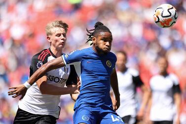 LANDOVER, MARYLAND - JULY 30: Christopher Nkunku of Chelsea is challenged by Luc De Fougerolles of Fulham during the Premier League Summer Series match between Chelsea FC and Fulham FC at FedExField on July 30, 2023 in Landover, Maryland.    Tim Nwachukwu / Getty Images / AFP (Photo by Tim Nwachukwu  /  GETTY IMAGES NORTH AMERICA  /  Getty Images via AFP)