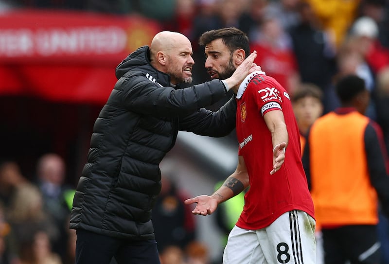 Manchester United manager Erik ten Hag with Bruno Fernandes. Reuters