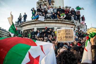epa07393427 Protesters from the Franco-Algerian community gather at Republic square to protest against the fifth term of Algerian President, Abdelaziz Bouteflika in Paris, France, 24 February 2019. Abdelaziz Bouteflika, has been serving as the president since 1999, has announced on 19 February he will be running for a fifth term in presidential elections scheduled for 18 April 2019.  EPA/CHRISTOPHE PETIT TESSON