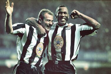 NEWCASTLE UPON-TYNE, UNITED KINGDOM - OCTOBER 20: Newcastle strikers Alan Shearer (l) and Les Ferdinand celebrate the fourth goal scored by Shearer during the Premier League match between Newcastle United and Manchester United at St Jame's Park on October 20, 1996 in Newcastle, England, Newcastle won the game 5-0. (Photo by Ben Radford/Allsport/Getty Images/Hulton Archive)