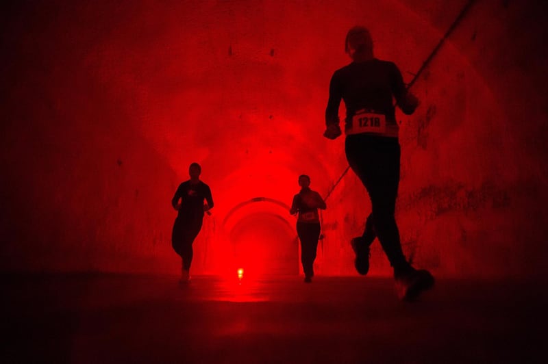 Contestants run in a tunnel during the BBU underground half marathon in Kobanya district of eastern Budapest, Hungary.  EPA