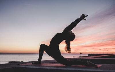 Gentle exercise and mindful activities such as yoga are stress-reducing, which can help maintain cortisol levels. Unsplash / Kike Vega