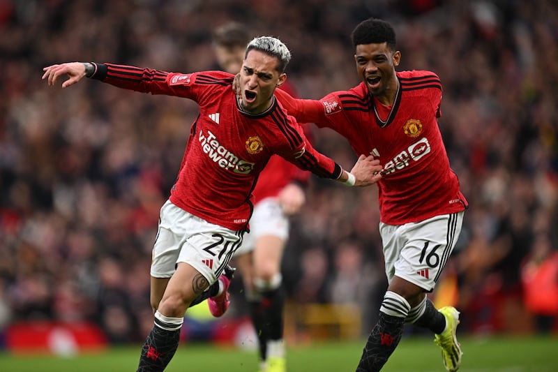 Manchester United's Brazilian winger Antony celebrates his equaliser which made it 2-2. AFP