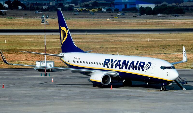 (FILES) In this file photo taken on July 25, 2018, a Ryanair plane sits on the tarmac at the airport in Valencia as the airline's cabin crew began a two-day strike.
Ryanair on August 3, 2018, proposed third-party mediation as its Irish pilots went on strike for a fourth day, disrupting flights at Europe's biggest no-frills airline. / AFP PHOTO / JOSE JORDAN