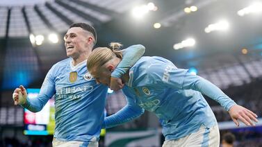 Manchester City's Erling Haaland celebrates scoring his side's third goal against Manchester United at the Etihad Stadium. PA