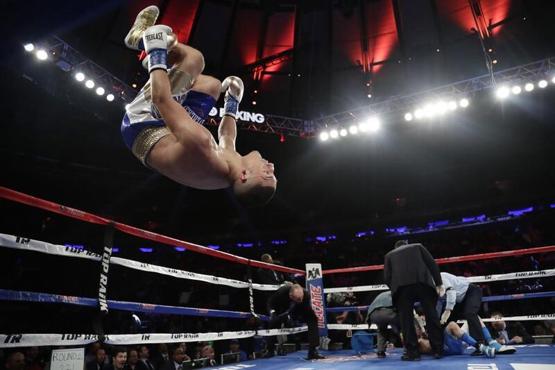 Teofimo Lopez celebrates knocking out Ronald Rivas in the second round of their lightweight boxing bout in New York. Frank Franklin II / AP Photo