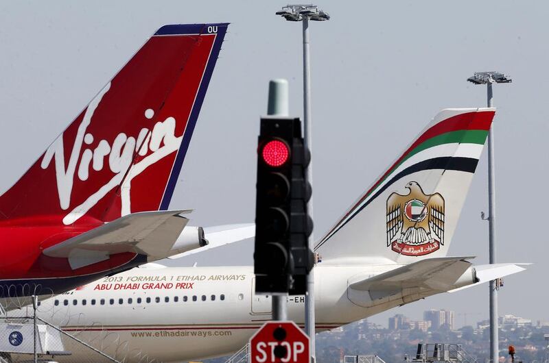 Etihad and Virgin Australia signed a 10-year strategic partnership agreement in August 2010 that spans codesharing on flights, joint sales and marketing activities. Daniel Munoz / Reuters