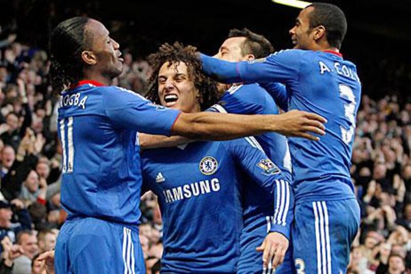 Chelsea's David Luiz, centre, celebrates his goal against Manchester City with teammates (from left) Didier Drogba , John Terry and Ashley Cole. Ian Kington /AFP