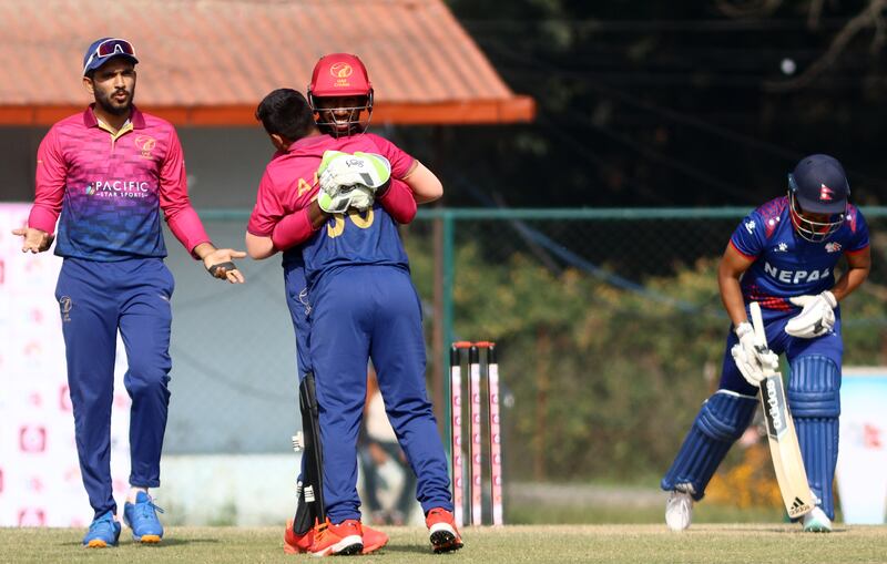 Aayan Khan celebrates one of his four wickets.