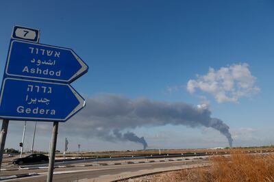 Smoke rising from Israeli cities of Ashdod and Gedera following rocket launches from Gaza in October. EPA