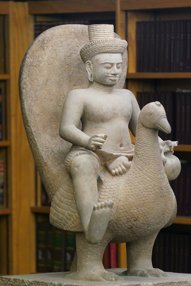This 10th century sandstone statue depicting the Hindu god of war, Skanda, riding on a peacock will be returned to Cambodia. AP