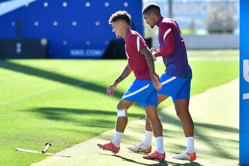 Barcelona's Brazilian midfielder Philippe Coutinho and Uruguayan defender Ronald Araujo. AFP