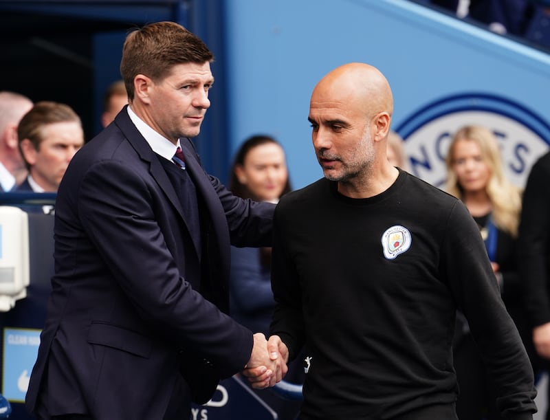 Steven Gerrard and Manchester City manager Pep Guardiola. PA