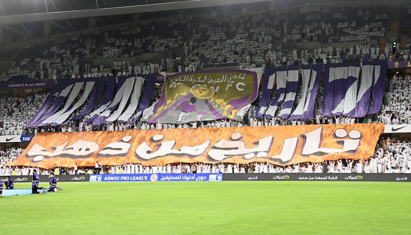 Al Ain supporters unfurl a banner at Hazza bin Zayed Stadium.