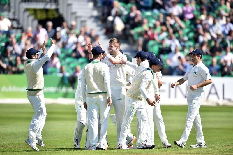 MALAHIDE, IRELAND - MAY 12: Bowler, Boyd Rankin of Ireland celebrates as Ireland take their first ever test wicket during the Ireland v Pakistan test cricket match on May 12, 2018 in Malahide, Ireland. (Photo by Charles McQuillan/Getty Images)