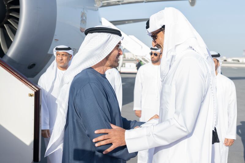 President Sheikh Mohamed is received by Qatari Emir Sheikh Tamim at Doha International Airport on Monday. All photos: UAE Presidential Court