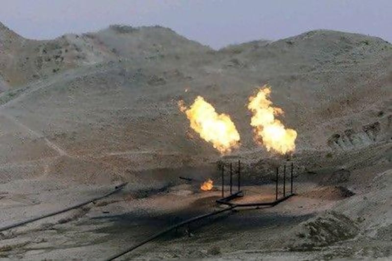Gas flares burn near an oil well on the outskirts of Masjed Soleiman in Tehran. Iran ranks third in terms of flaring levels.