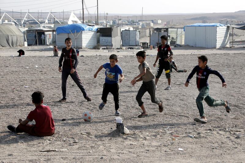 Displaced Iraqi children play at Habbaniyah camp, near Fallujah city, in Iraq. EPA