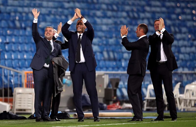 Manchester City chairman Khaldoon Al Mubarak (second left) and other officials applaud after the final whistle. PA