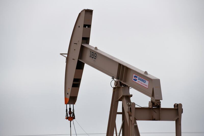 FILE PHOTO: A pump jack operates in the Permian Basin oil and natural gas production area near Odessa, Texas, U.S., February 10, 2019. Picture taken February 10, 2019.    REUTERS/Nick Oxford/File Photo