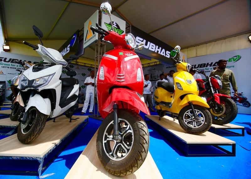 Electric scooters on display at the 'Electric Vechicle' or EV Expo and Green Energy Summit 2022 in Bangalore, India. As companies ramp up manufacturing in India, across categories ranging from cars and electronics, several manufacturers are also increasingly moving towards greater innovation and making more components locally. EPA