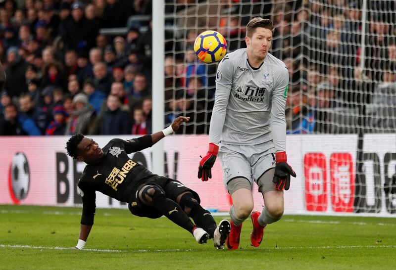 Soccer Football - Premier League - Crystal Palace vs Newcastle United - Selhurst Park, London, Britain - February 4, 2018   Newcastle United's Christian Atsu in action with Crystal Palace's Wayne Hennessey                     REUTERS/David Klein    EDITORIAL USE ONLY. No use with unauthorized audio, video, data, fixture lists, club/league logos or "live" services. Online in-match use limited to 75 images, no video emulation. No use in betting, games or single club/league/player publications.  Please contact your account representative for further details.