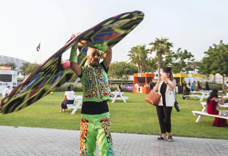 Abu Dhabi, United Arab Emirates- Performers entertaining visitors at the Expo 2020 countdown at The Louvre, Saadiyat.  Leslie Pableo for The National