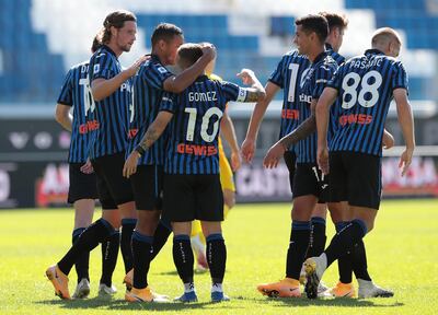 BERGAMO, ITALY - OCTOBER 04:  Alejandro Gomez of Atalanta BC celebrates his goal with his team-mates during the Serie A match between Atalanta BC and Cagliari Calcio at Gewiss Stadium on October 4, 2020 in Bergamo, Italy.  (Photo by Emilio Andreoli/Getty Images)
