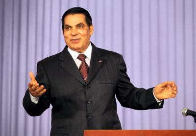 Tunisian President Zine El-Abidine Ben Ali gestures as he delivers a speech during the closing of the Democratic Constitutional Rally (RCD) Congress on August 02, 2008, in Tunis. Ben Ali announced on July 30 his fifth candidacy for presidential elections next year. AFP PHOTO/ FETHI BELAID (Photo by FETHI BELAID / AFP)