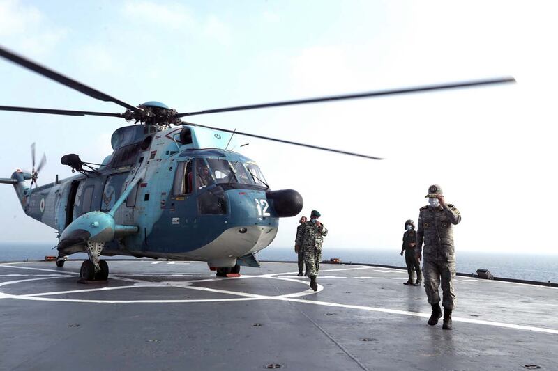 epa08663103 A handout photo made available by Iranian Army official website shows an Iranian army helicopter lands on a warship during the last day of military exercise in Persian Gulf, near strategic strait of Hormuz, southern Iran, 12 September 2020. Iran held a three-days military exercise in Gulf and Oman sea.  EPA/IRANIAN ARMY OFFICE / HANDOUT  HANDOUT EDITORIAL USE ONLY/NO SALES