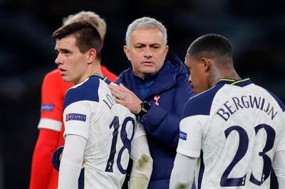 Tottenham Hotspur's Portuguese head coach Jose Mourinho (C) reacts with Tottenham Hotspur's Argentinian midfielder Giovani Lo Celso (L) and Tottenham Hotspur's Dutch midfielder Steven Bergwijn at the final whistle during the UEFA Europa League 1st round Group J football match between Tottenham Hotspur and Antwerp at the Tottenham Hotspur Stadium in London, on December 10, 2020.  / AFP / POOL / Kirsty Wigglesworth
