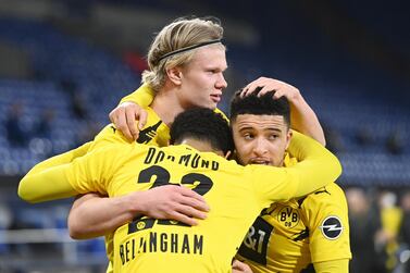 Borussia Dortmund have scouted and recruited some of Europe's best young talents in recent seasons, including Erling Braut Haaland, centre, Jadon Sancho, right, and Jude Bellingham. Reuters 