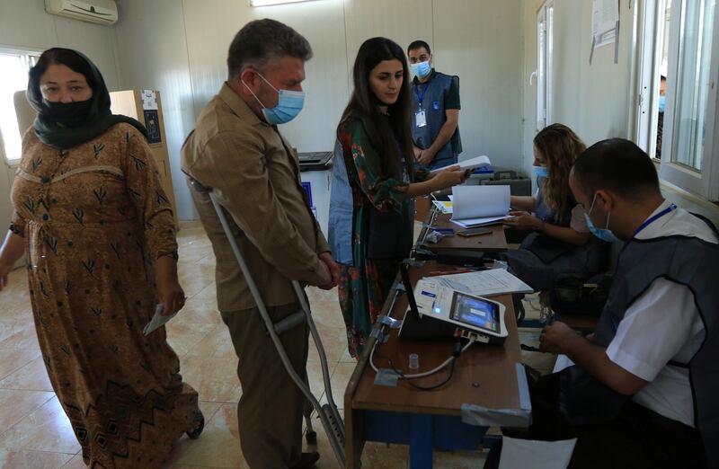 Displaced Yazidis prepare to vote at the Sharya camp in Duhok, Iraq. Reuters