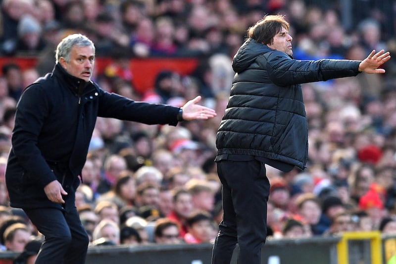 Manchester United's Portuguese manager Jose Mourinho (L) and Chelsea's Italian head coach Antonio Conte (R) gesture on the touchline during the English Premier League football match between Manchester United and Chelsea at Old Trafford in Manchester, north west England, on February 25, 2018. / AFP PHOTO / Oli SCARFF / RESTRICTED TO EDITORIAL USE. No use with unauthorized audio, video, data, fixture lists, club/league logos or 'live' services. Online in-match use limited to 75 images, no video emulation. No use in betting, games or single club/league/player publications.  / 